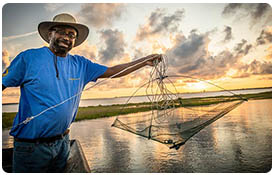 man with crab trap